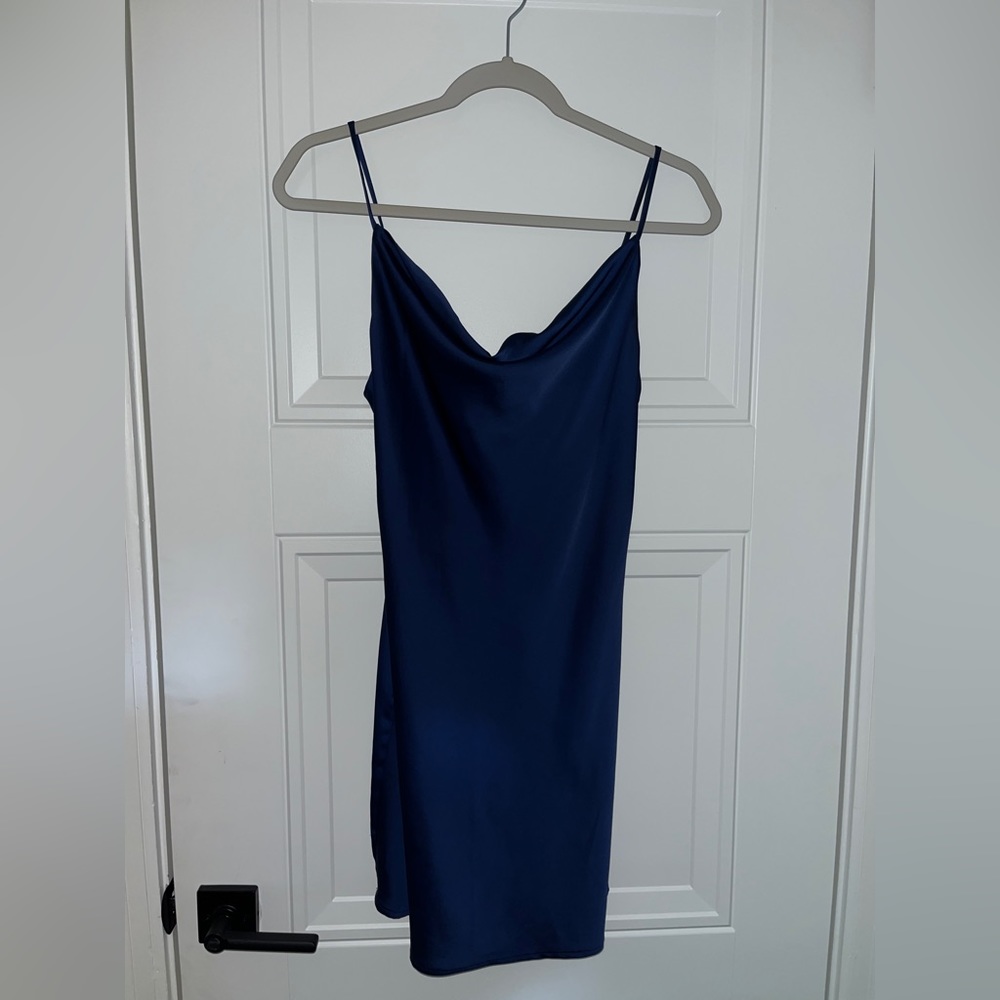 Navy blue mini dress with a scoop neck.
